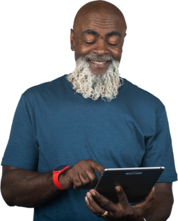 Bearded man using tablet